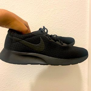Black NIKE women’s shoes.